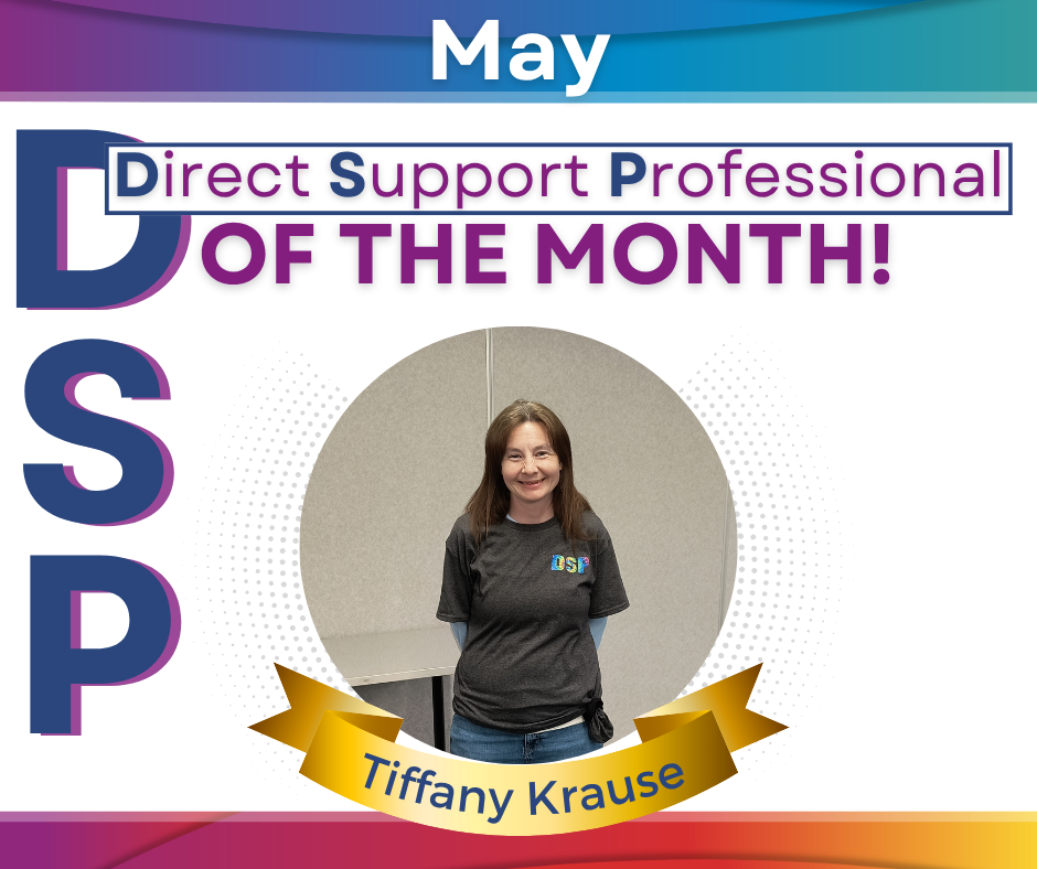 Pictured: One woman standing and smiling in a DSP of the month picture frame.