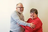 Older couple hugging